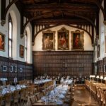 a large dining hall with tables and chairs