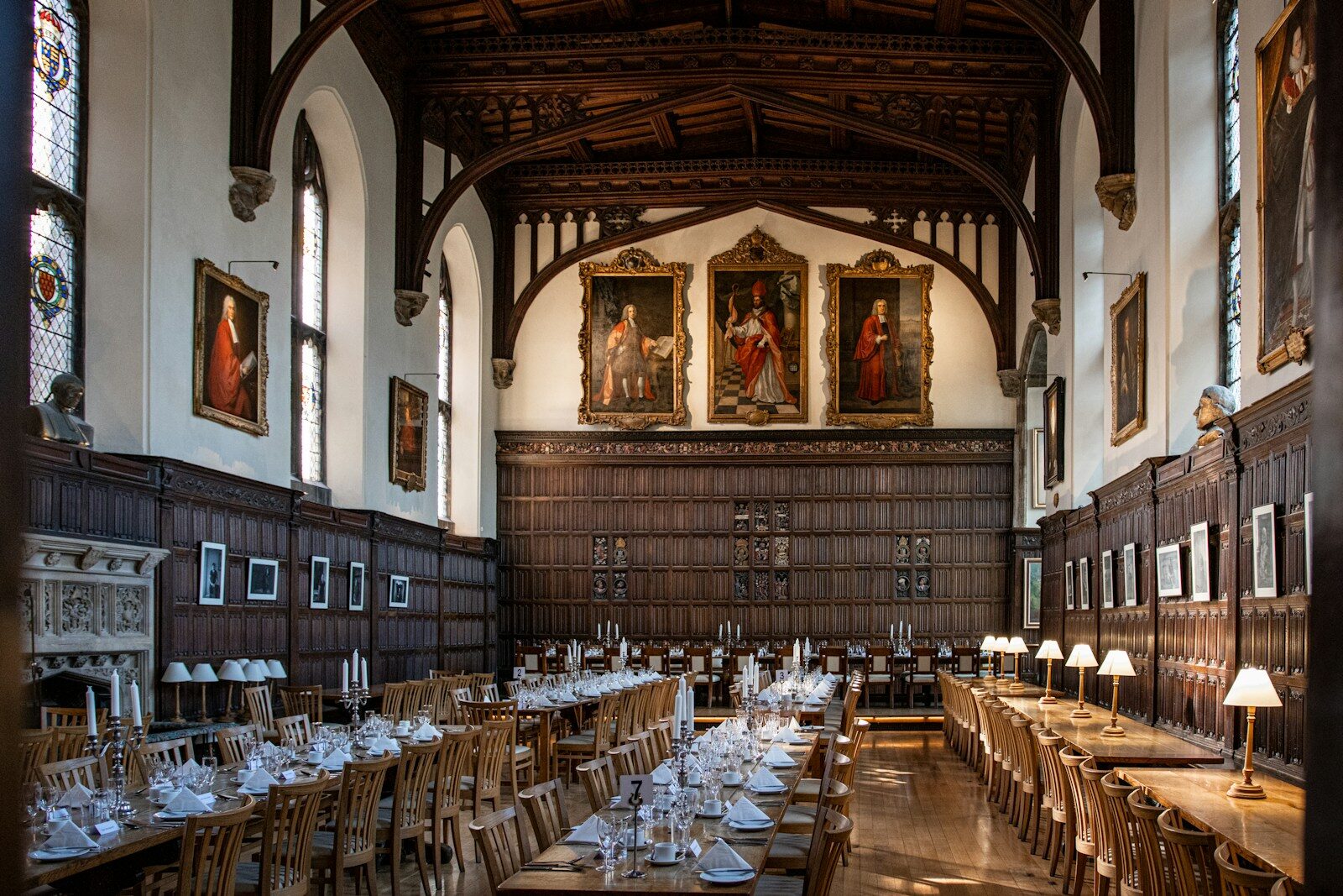 a large dining hall with tables and chairs