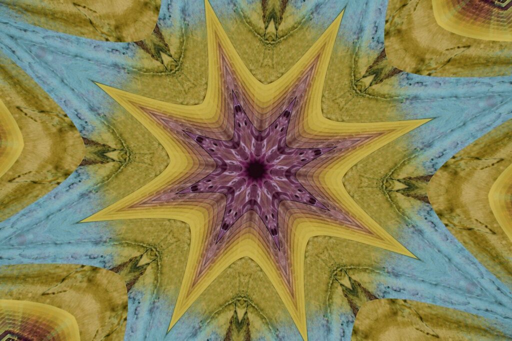 Abstract kaleidoscope pattern with yellow and blue hues