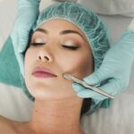 woman receiving facial skincare treatment